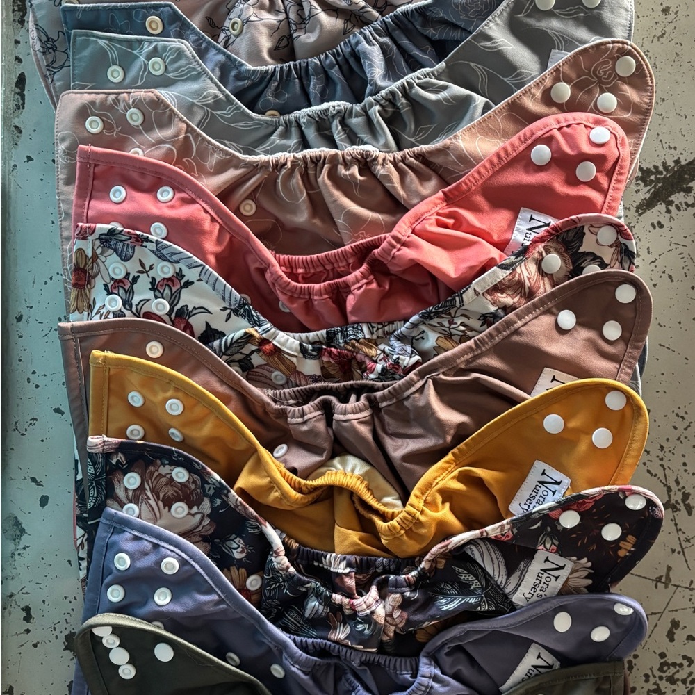 Nora’s Nursery cloth diaper lot (13 diapers, inserts)